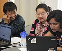 Students working together in groups Students working together in groups